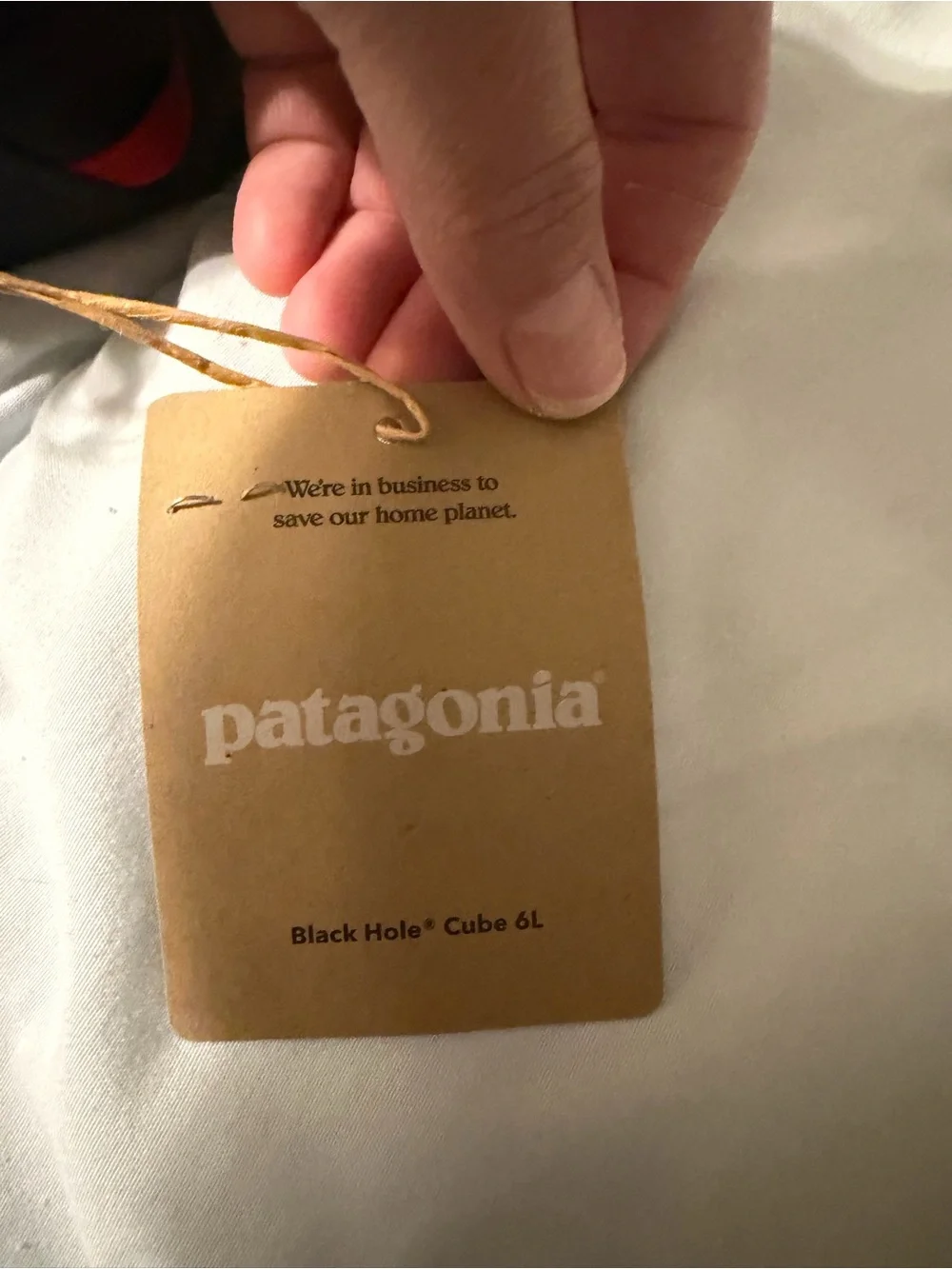 Patagonia Black Toiletry Bag with Blue Logo and Red Trim
